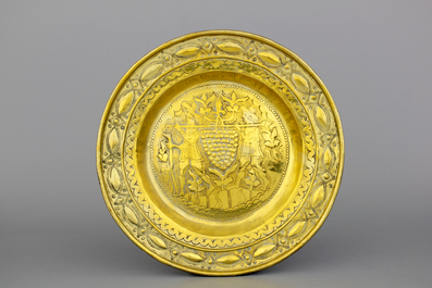 A Flemish brass alms dish, an Italian brass basin and a French brass kettle, all 17th C.